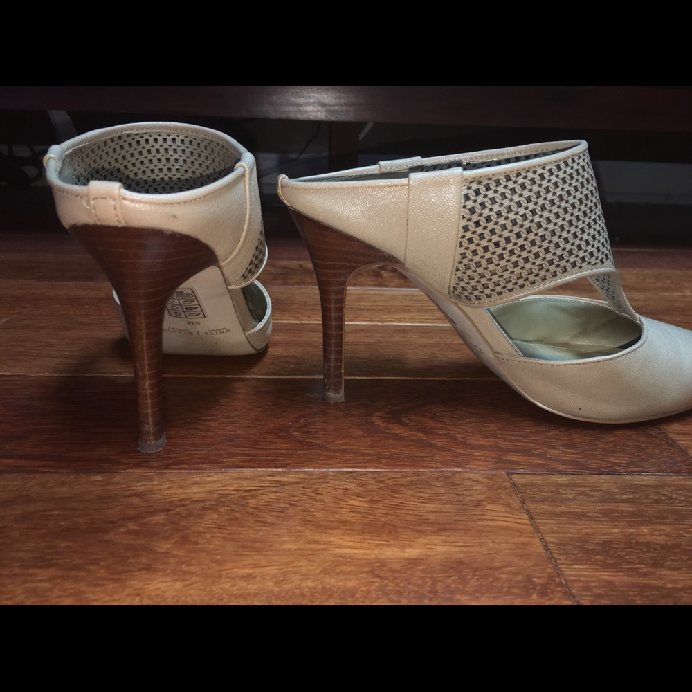 Beige mules.